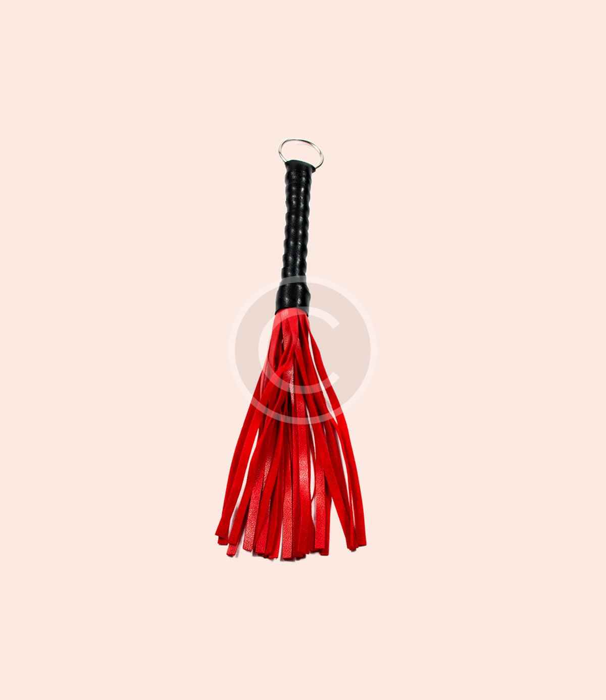 Mini red leather flogger
